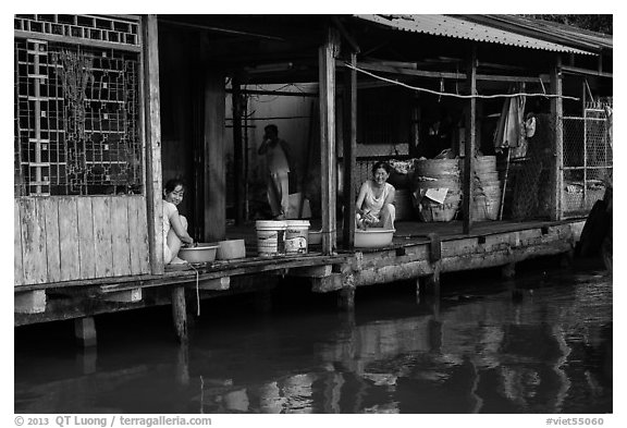 Riverside food preparation. Can Tho, Vietnam (black and white)