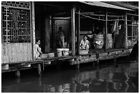 Riverside food preparation. Can Tho, Vietnam (black and white)