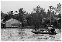 Schoolchildren on boat commute. Can Tho, Vietnam (black and white)