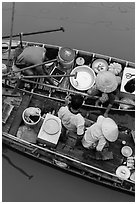 Couples on two side-by-side boats seen from above. Can Tho, Vietnam (black and white)