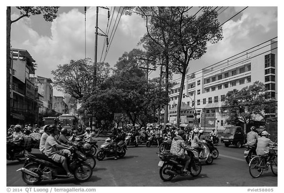 Motorcycle traffic near University of Medicine. Cholon, Ho Chi Minh City, Vietnam (black and white)