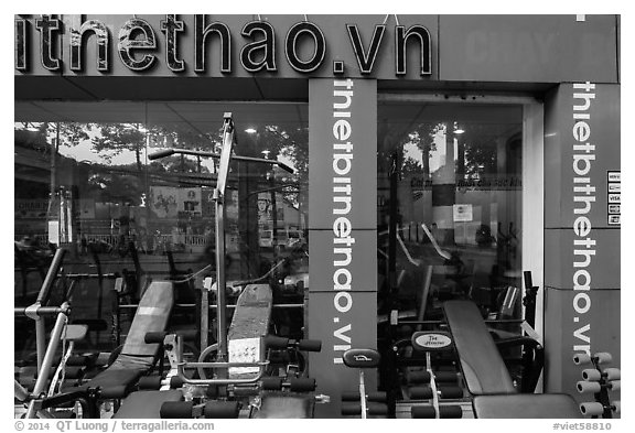 Store selling exercise equipment. Ho Chi Minh City, Vietnam (black and white)