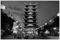 Evening worship at Viet Nam Quoc Tu pagoda. Ho Chi Minh City, Vietnam ( black and white)