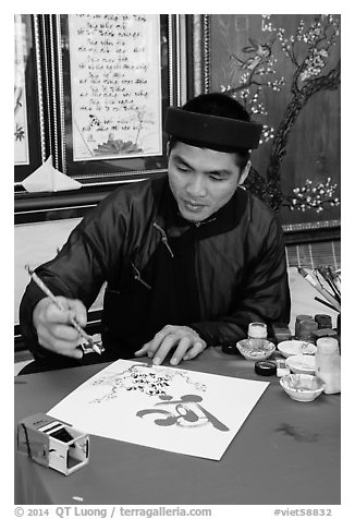 Caligrapher in traditional costume. Ho Chi Minh City, Vietnam (black and white)
