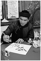 Caligrapher in traditional costume. Ho Chi Minh City, Vietnam ( black and white)