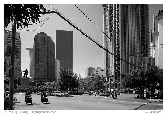 Statue of hero Tran Hung Dao and high-rises. Ho Chi Minh City, Vietnam (black and white)