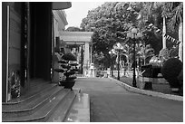 Photograph and tank that crashed through presidential palace. Ho Chi Minh City, Vietnam ( black and white)
