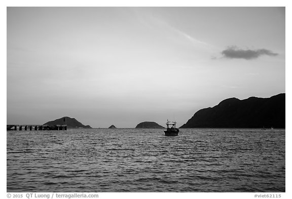 Boats and Con Son Bay at sunset. Con Dao Islands, Vietnam (black and white)