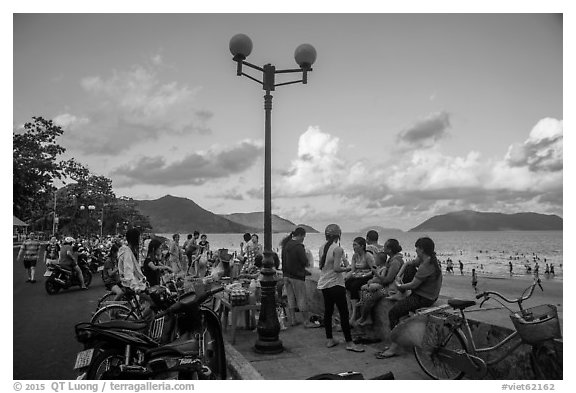 Waterfront becomes animated in late afternoon, Con Son. Con Dao Islands, Vietnam (black and white)