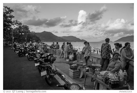Food vendors on seafront promenade, Con Son. Con Dao Islands, Vietnam (black and white)