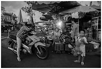 Con Dao market scene at dusk, Con Son. Con Dao Islands, Vietnam ( black and white)