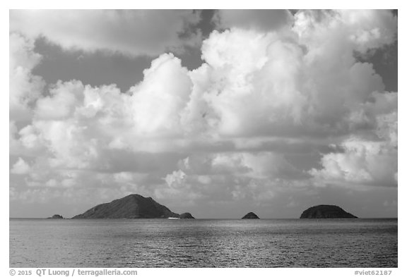 Tropical clouds above Bay Canh Island and other islets. Con Dao Islands, Vietnam (black and white)