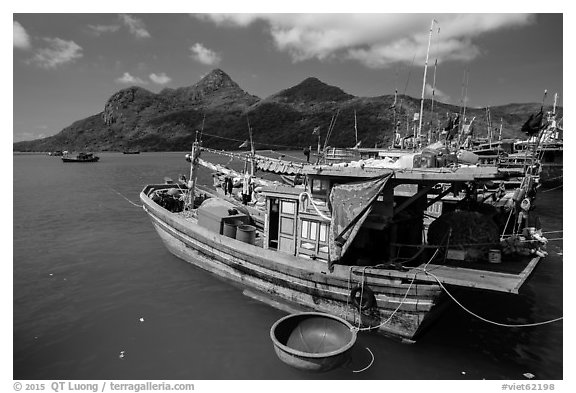 Wooden fishing boats in Ben Dam harbor. Con Dao Islands, Vietnam (black and white)