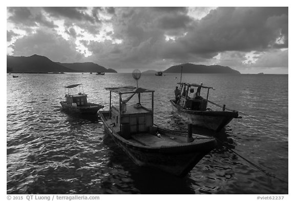 Fishing boats at sunrise, Con Son harbor. Con Dao Islands, Vietnam (black and white)