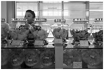 Eddible birds nest and vendor. Con Dao Islands, Vietnam ( black and white)