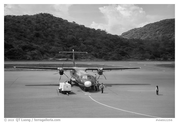 Turboprop plane and airport. Con Dao Islands, Vietnam (black and white)
