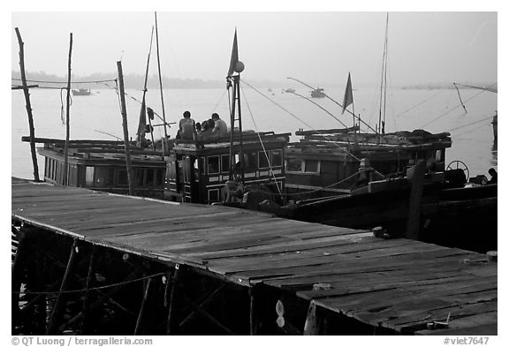 Pier and fishing boats, Nhat Le River, Dong Hoi. Vietnam