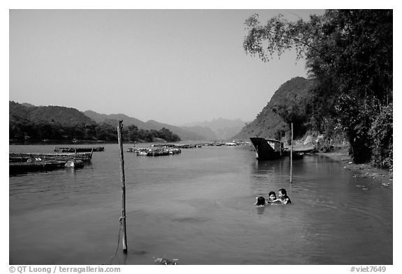 River with kids playing, Son Trach. Vietnam