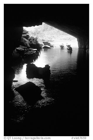 Interior and entrance of Phong Nha Cave with Rocks and boats. Vietnam (black and white)