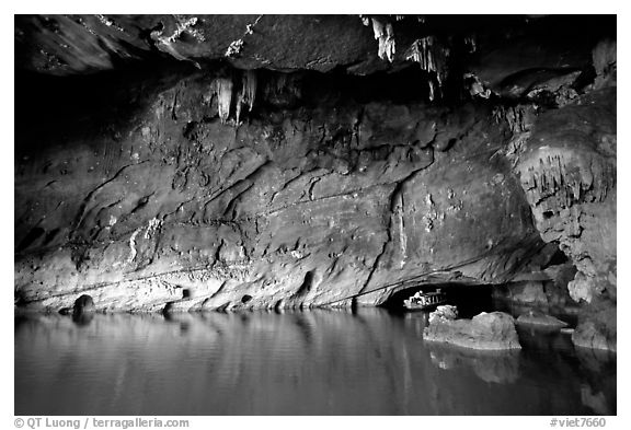 Tour boat getting out of a tunnel, Phong Nha Cave. Vietnam