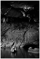 Boat and tunnel, Phong Nha Cave. Vietnam (black and white)