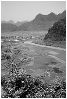 Boat inside the lower cave, Phong Nha Cave. Vietnam ( black and white)