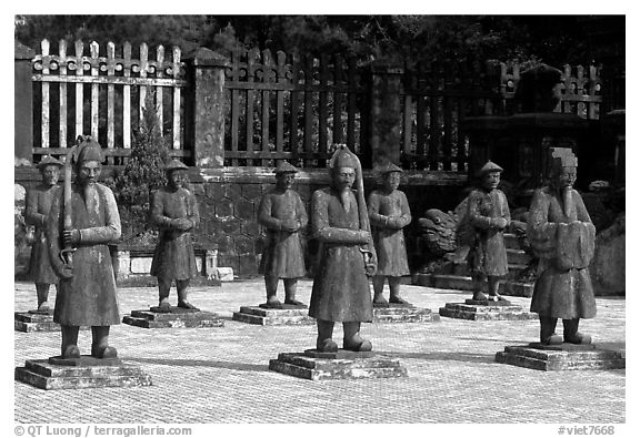 Statues of Mandarins in Khai Dinh Mausoleum. Hue, Vietnam (black and white)