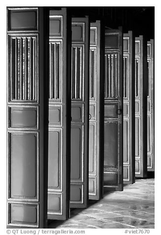 Red doors of the temple inside the Minh Mang Mausoleum. Hue, Vietnam (black and white)