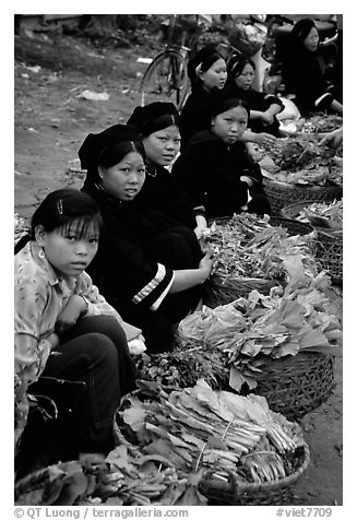 Women of the Nung hill tribe sell vegetables at the Cao Bang market. Northeast Vietnam