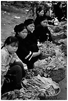 Women of the Nung hill tribe sell vegetables at the Cao Bang market. Northeast Vietnam (black and white)