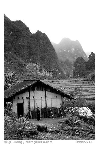 Rural home, terraced cultures, and karstic peaks, Ma Phuoc Pass area. Northeast Vietnam (black and white)