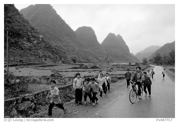 Children returning from school, Ma Phuoc Pass area. Northeast Vietnam (black and white)