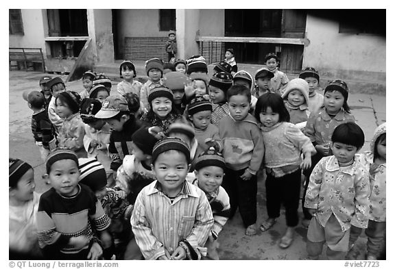 Schoolchildren dressed for the cool mountain weather. Northeast Vietnam (black and white)