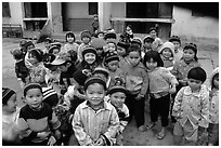 Schoolchildren dressed for the cool mountain weather. Northeast Vietnam (black and white)