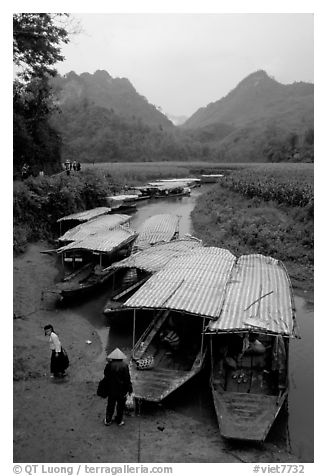 Boats waiting for villagers at a market. Northeast Vietnam (black and white)