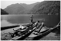 Dugout boats on the shore of Ba Be Lake. Northeast Vietnam (black and white)