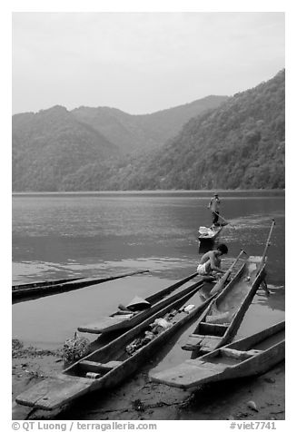 Typical dugout boats on the shore of Ba Be Lake. Northeast Vietnam (black and white)