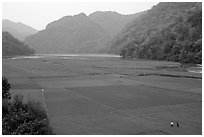 Rice fields below the Pac Ngoi village on the shores of Ba Be Lake. Northeast Vietnam (black and white)