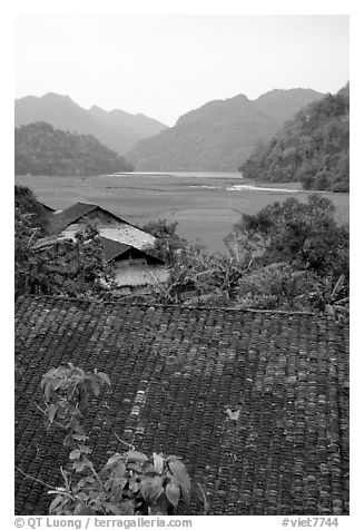 Thatched Roofs of Pac Ngoi village and fields. Northeast Vietnam (black and white)