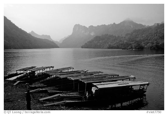 Boats on the shores of Ba Be Lake. Northeast Vietnam (black and white)