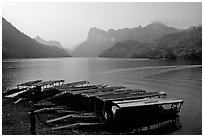 Boats on the shores of Ba Be Lake. Northeast Vietnam (black and white)