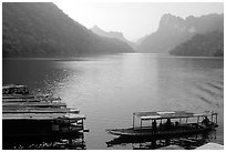 Boats on the shores of Ba Be Lake. Northeast Vietnam (black and white)