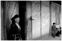 Elderly  tribewoman outside her house, near Mai Chau. Northwest Vietnam (black and white)