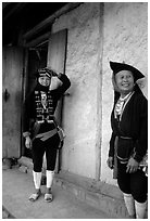 Two generations of tribewomen outside their house, near Mai Chau. Northwest Vietnam ( black and white)