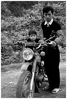 Hmong motorcyclist and boy, Xa Linh. Northwest Vietnam (black and white)