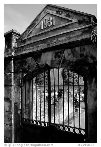 Door of the colonial jail where many political opponents were imprisoned, Son La. Northwest Vietnam (black and white)