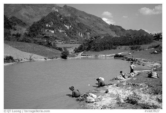 Thai women on the shores of a pond, near Tuan Giao. Northwest Vietnam