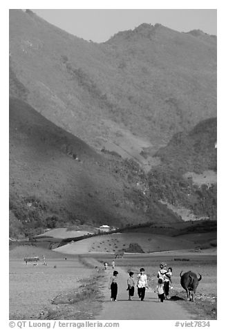 Villagers walking on the road, near Tuan Giao. Northwest Vietnam