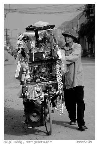 Street vendor uses his bicycle as a shop, Tam Duong. Northwest Vietnam