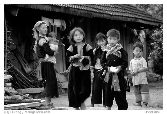Hmong family in front of their home, near Tam Duong. Northwest Vietnam